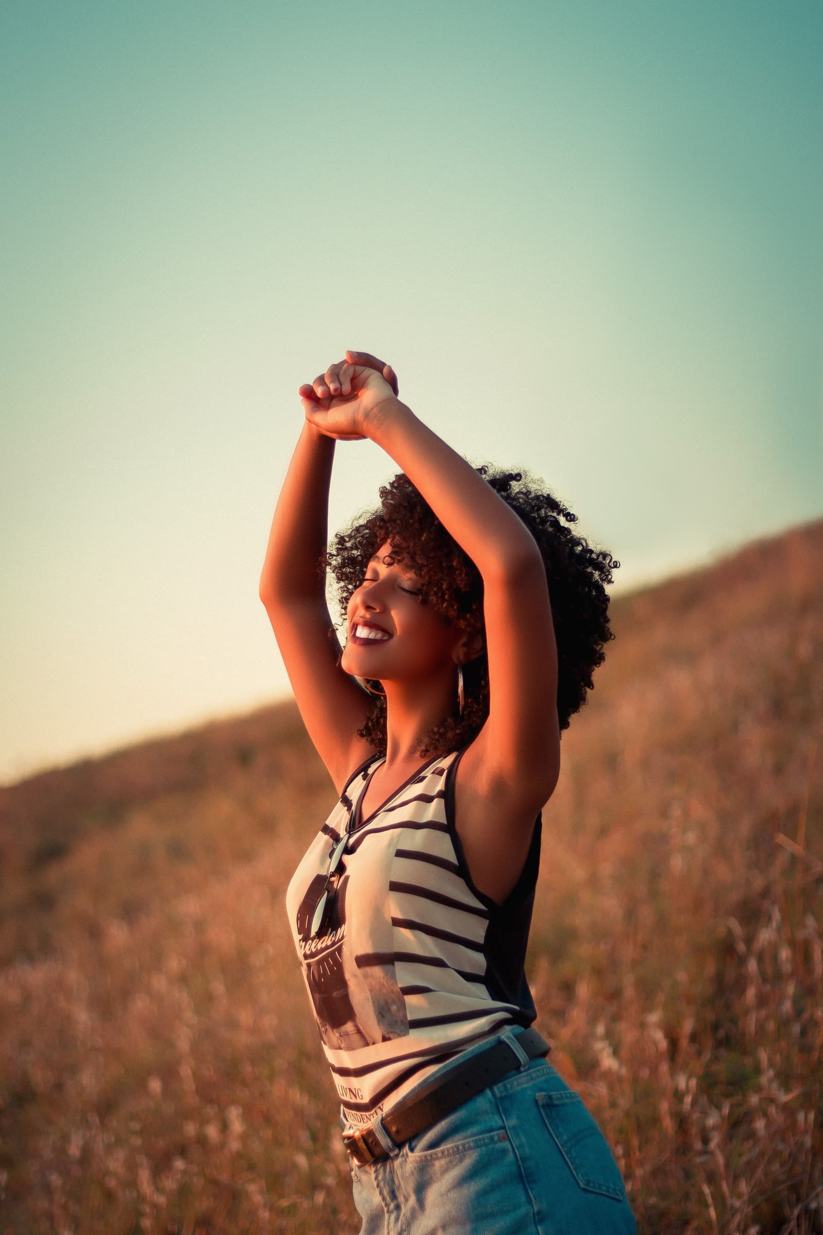 Confident woman mid-laugh